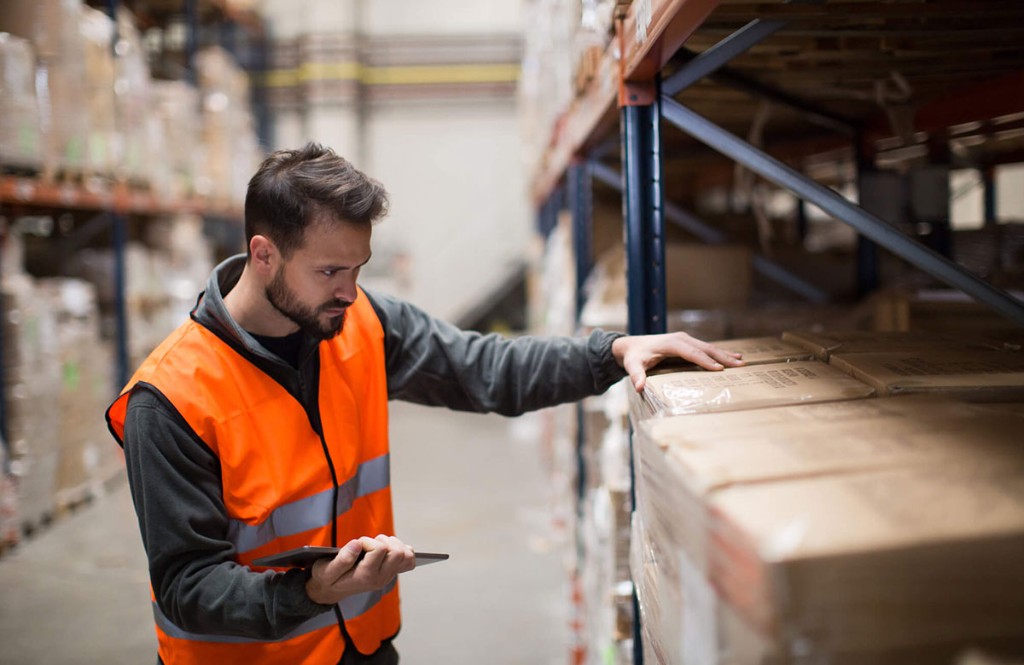 TYDD warehouse, checking consignments on the racking